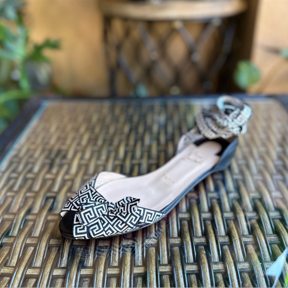 CHRISTAIN LOUBOUTIN lace up flats with bow